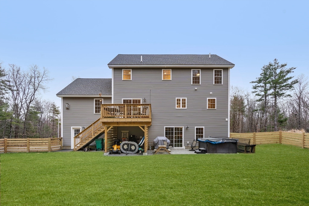 813 Chase Road Lunenburg, MA 01462 - Photo 37 of 41 a view of a house with a yard