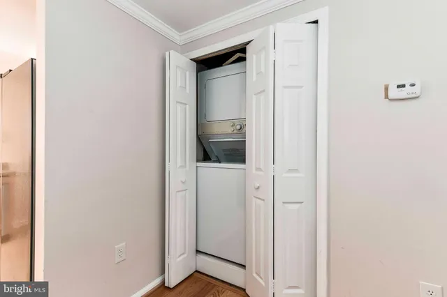 a view of a kitchen from the hallway