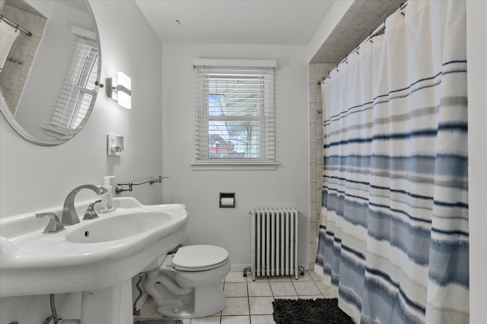 19924 Hillgate Road Mokena, IL 60448 - Photo 12 of 30 a bathroom with a sink and a mirror