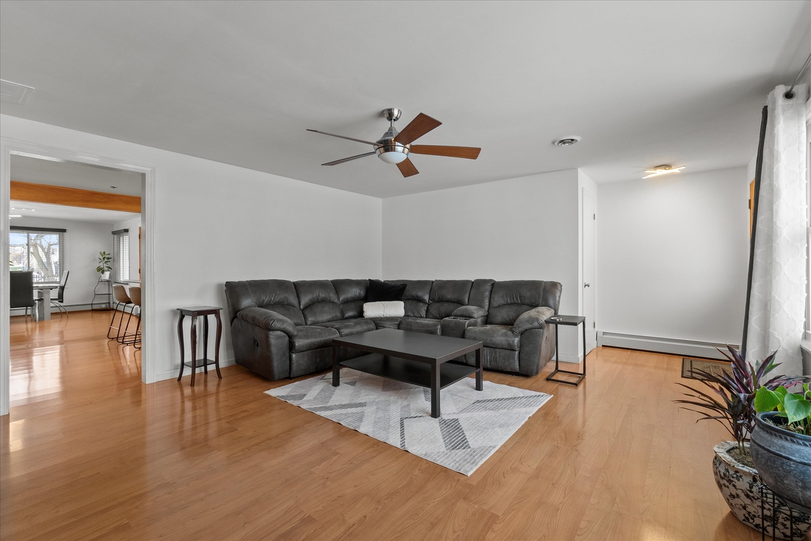 19924 Hillgate Road Mokena, IL 60448 - Photo 6 of 30 a living room with furniture and a wooden floor