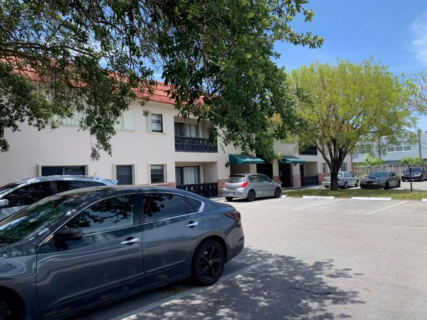 a car parked in front of a house