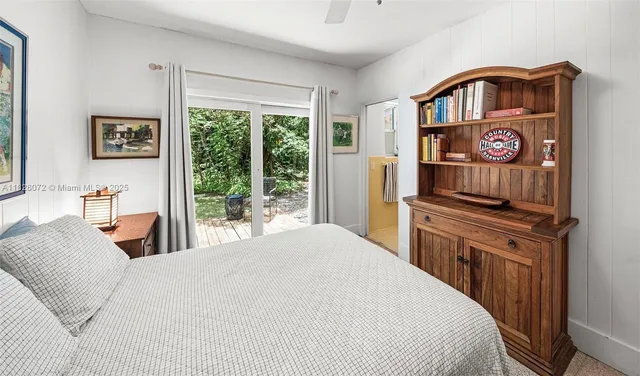 a bedroom with a bed and a closet