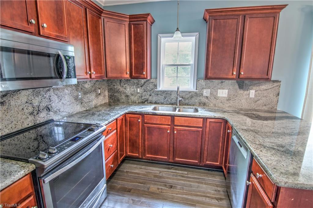 253 Ridge Drive Lexington, NC 27295 - Photo 12 of 27 Beautiful cherry cabinets.