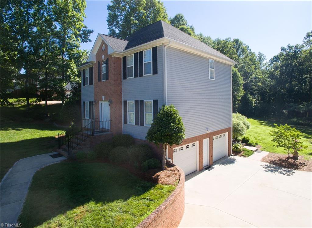 253 Ridge Drive Lexington, NC 27295 - Photo 3 of 27 2-car garage with cement driveway.