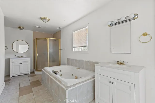 a bathroom with a toilet a sink and a mirror