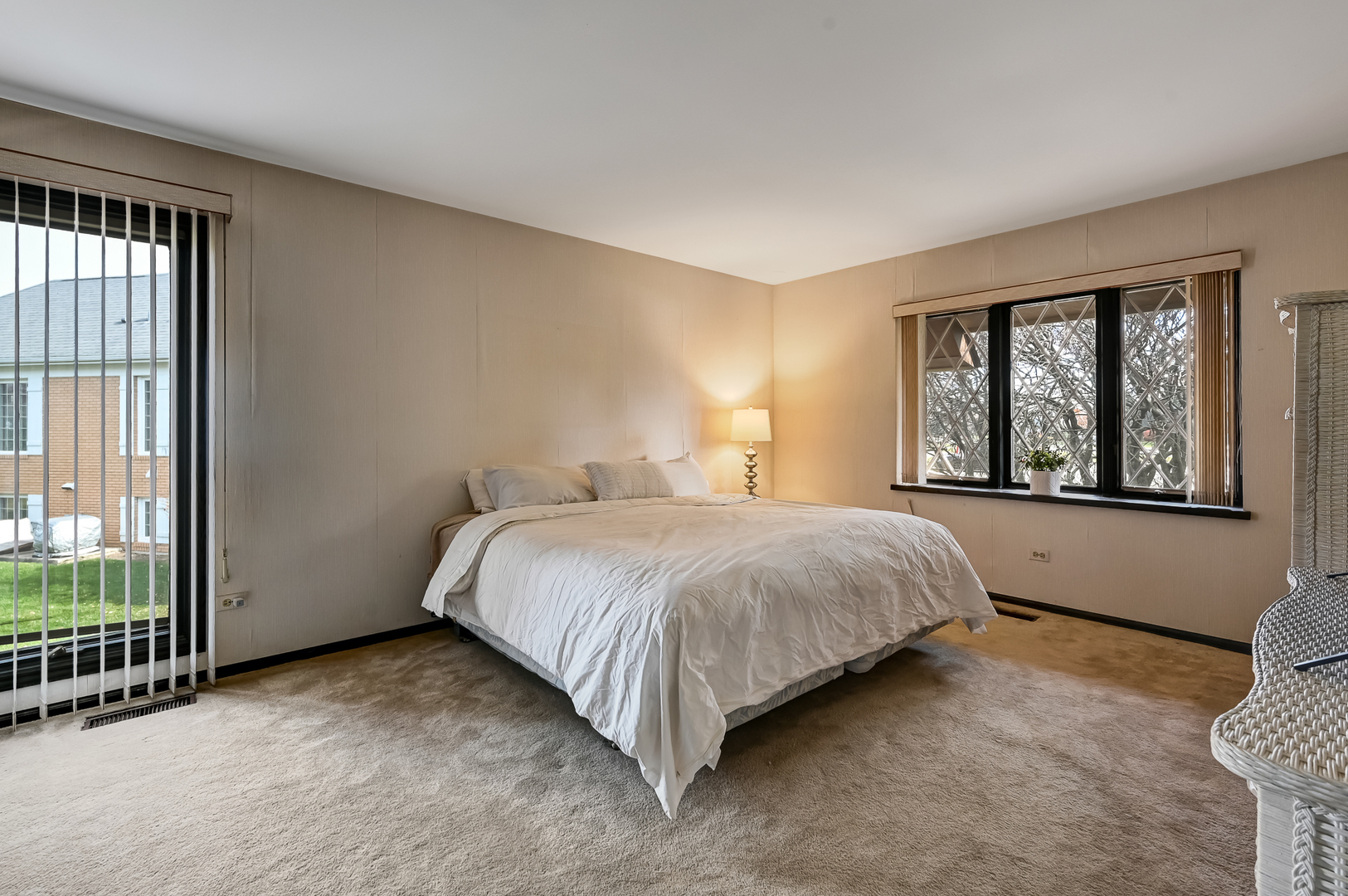 8402 Carriage Green Drive Darien, IL 60561 - Photo 21 of 39 a large bed sitting in a bedroom next to a window