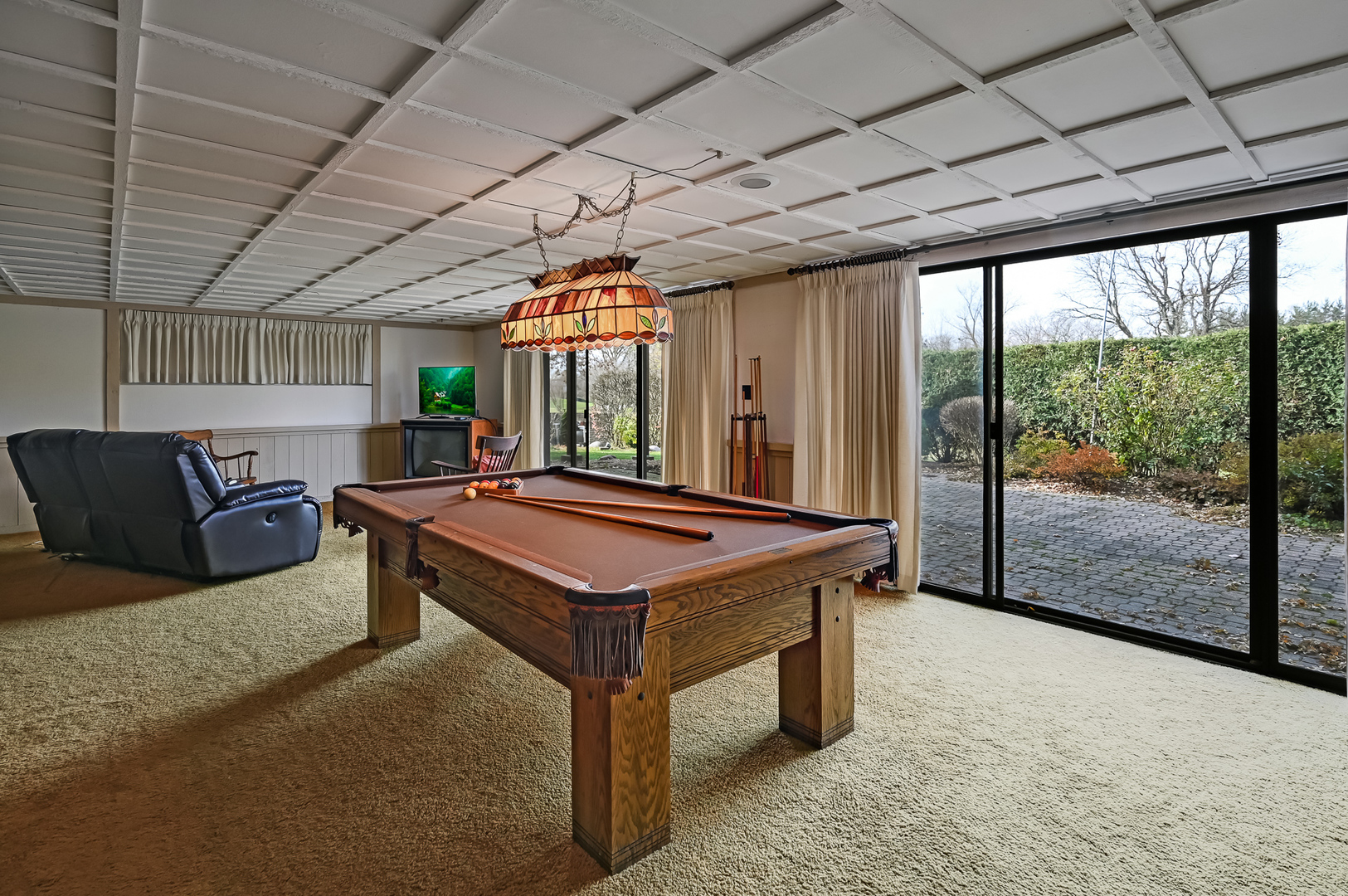 8402 Carriage Green Drive Darien, IL 60561 - Photo 26 of 39 a room with pool table and glass windows
