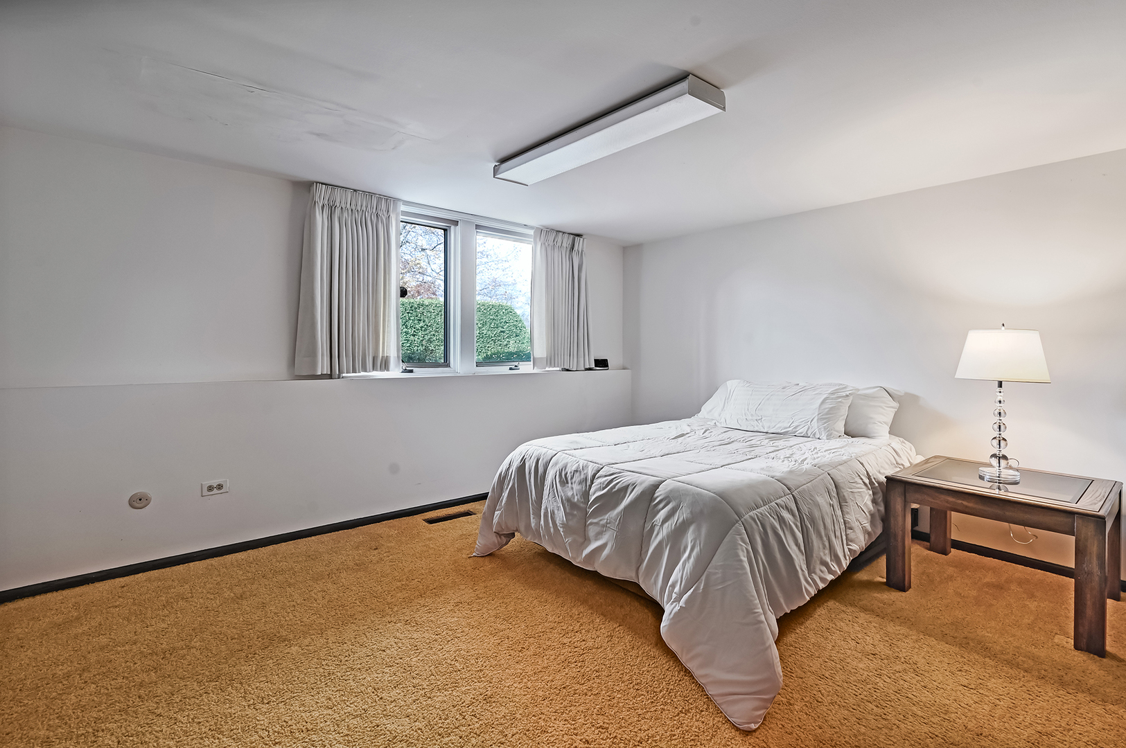 8402 Carriage Green Drive Darien, IL 60561 - Photo 28 of 39 a bedroom with a bed and a window