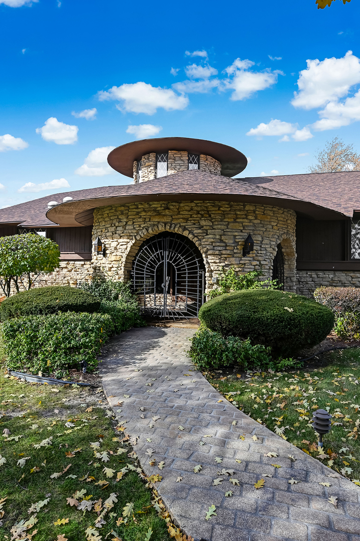 8402 Carriage Green Drive Darien, IL 60561 - Photo 4 of 39 a front view of a house with a yard