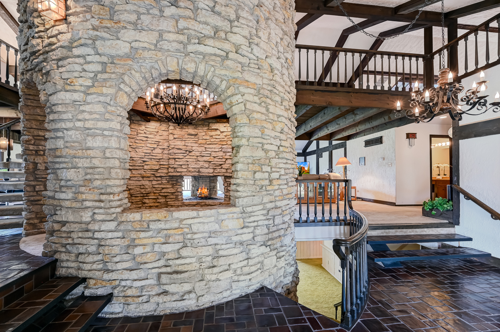 8402 Carriage Green Drive Darien, IL 60561 - Photo 6 of 39 a brick building with a bench and a potted plant