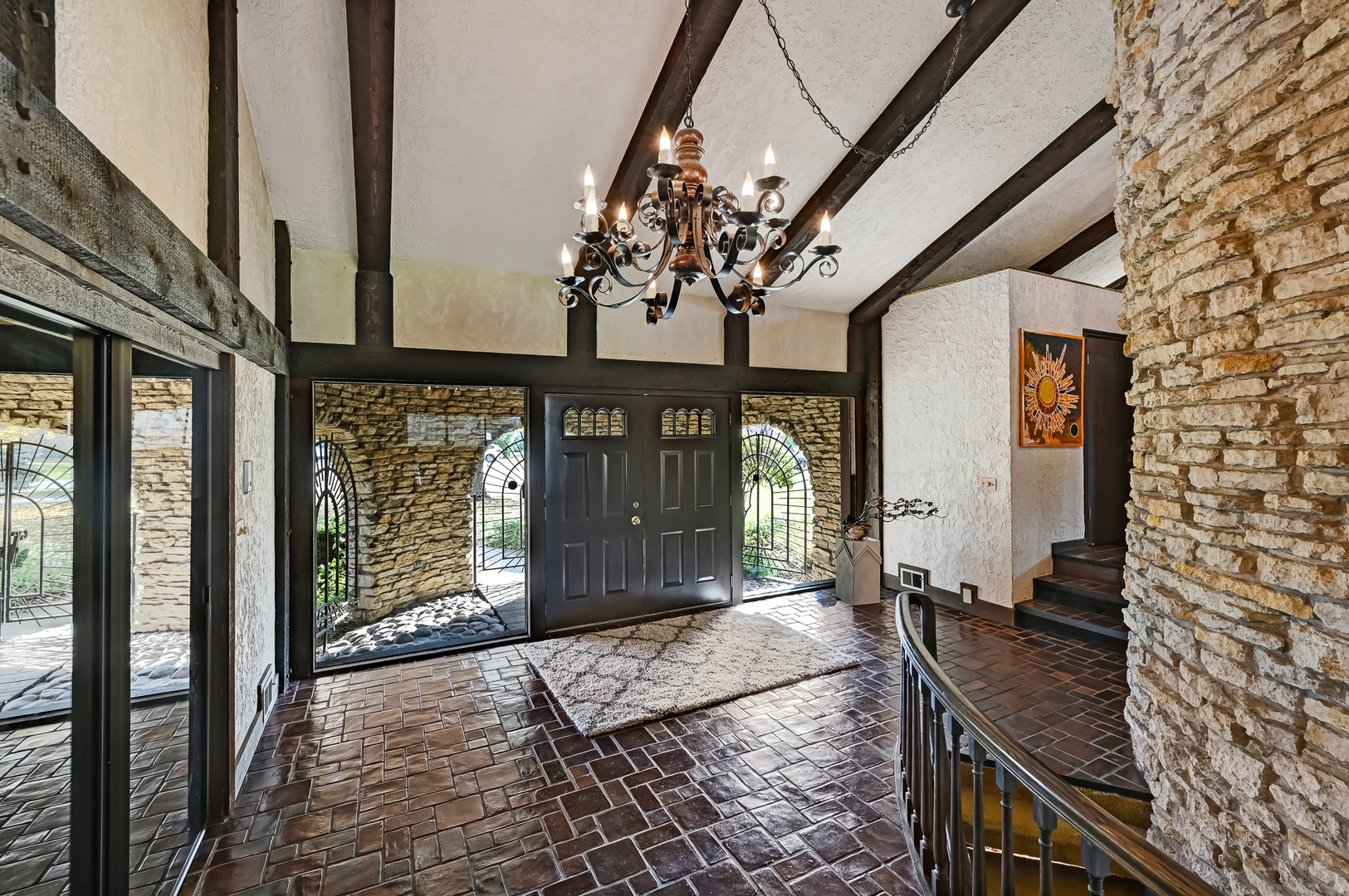 8402 Carriage Green Drive Darien, IL 60561 - Photo 7 of 39 a view of a porch with a furniture