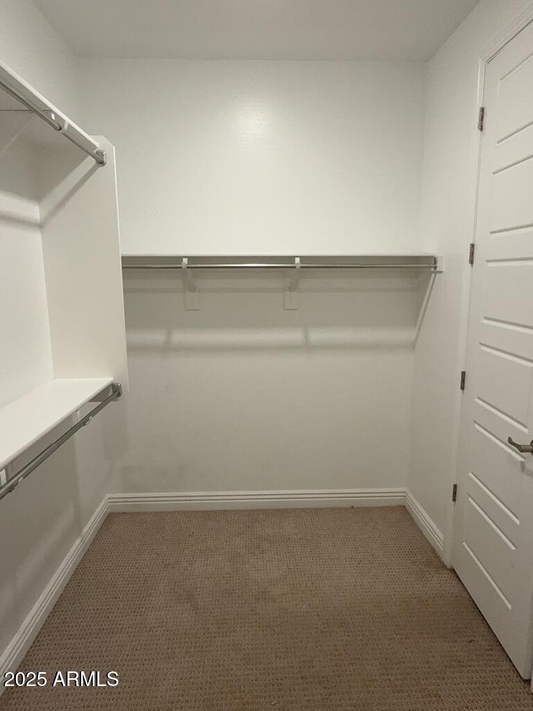 9135 West Minnezona Avenue Phoenix, AZ 85037 - Photo 11 of 22 a view of an empty room