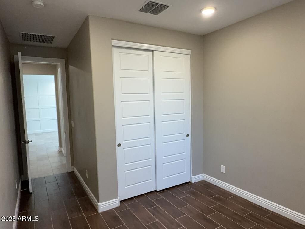 9135 West Minnezona Avenue Phoenix, AZ 85037 - Photo 13 of 22 a view of an empty room