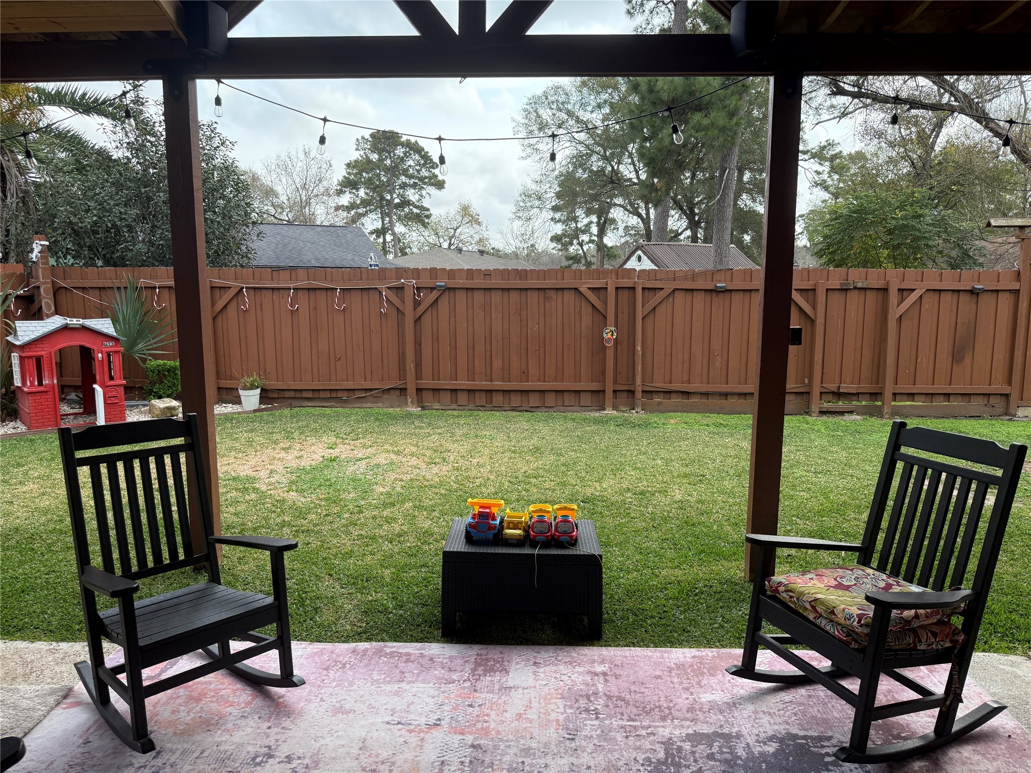 4622 Fitzwater Drive Spring, TX 77373 - Photo 14 of 16 a view of a porch with furniture and garden