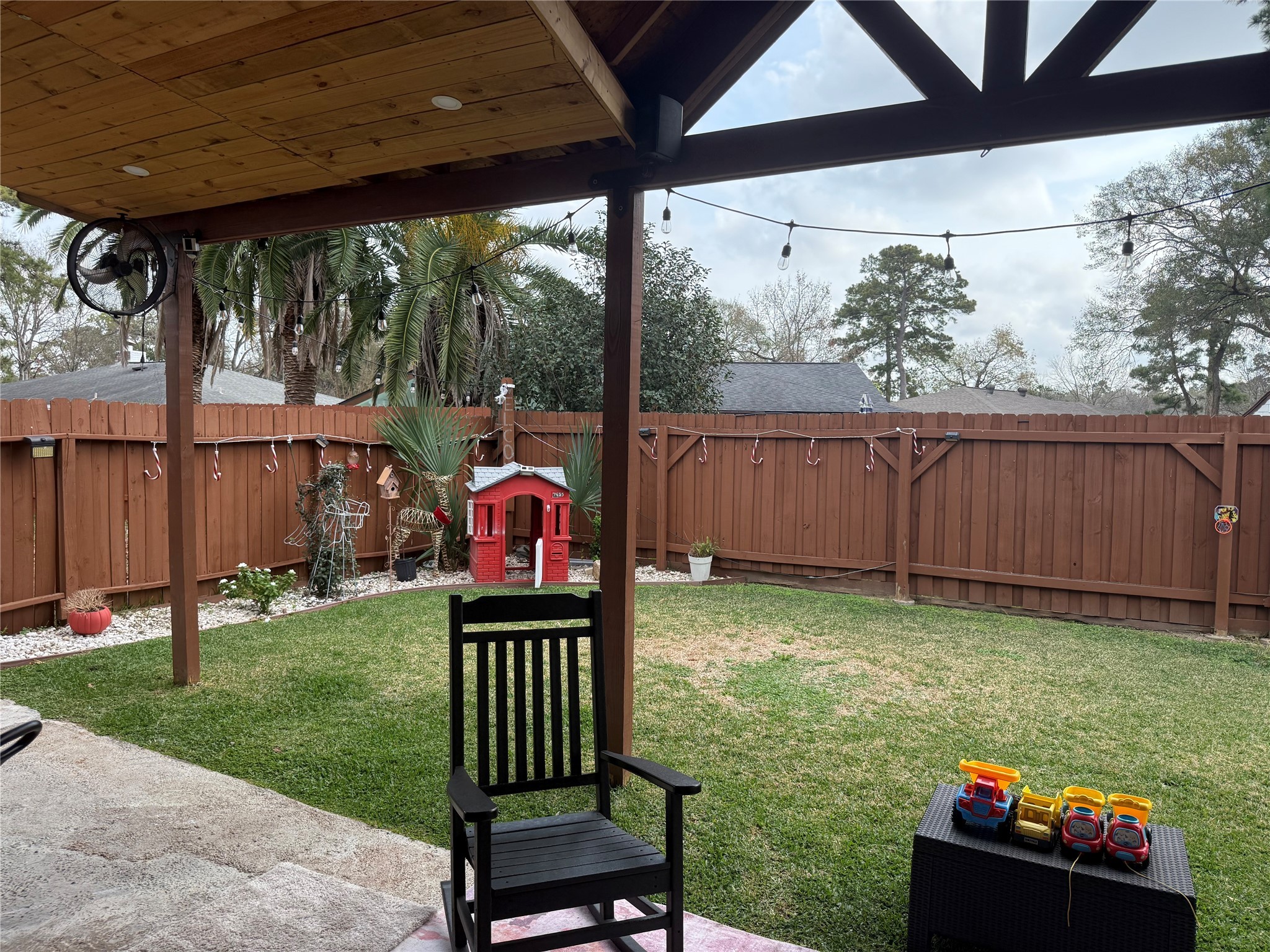 4622 Fitzwater Drive Spring, TX 77373 - Photo 16 of 16 a view of a porch with furniture and garden