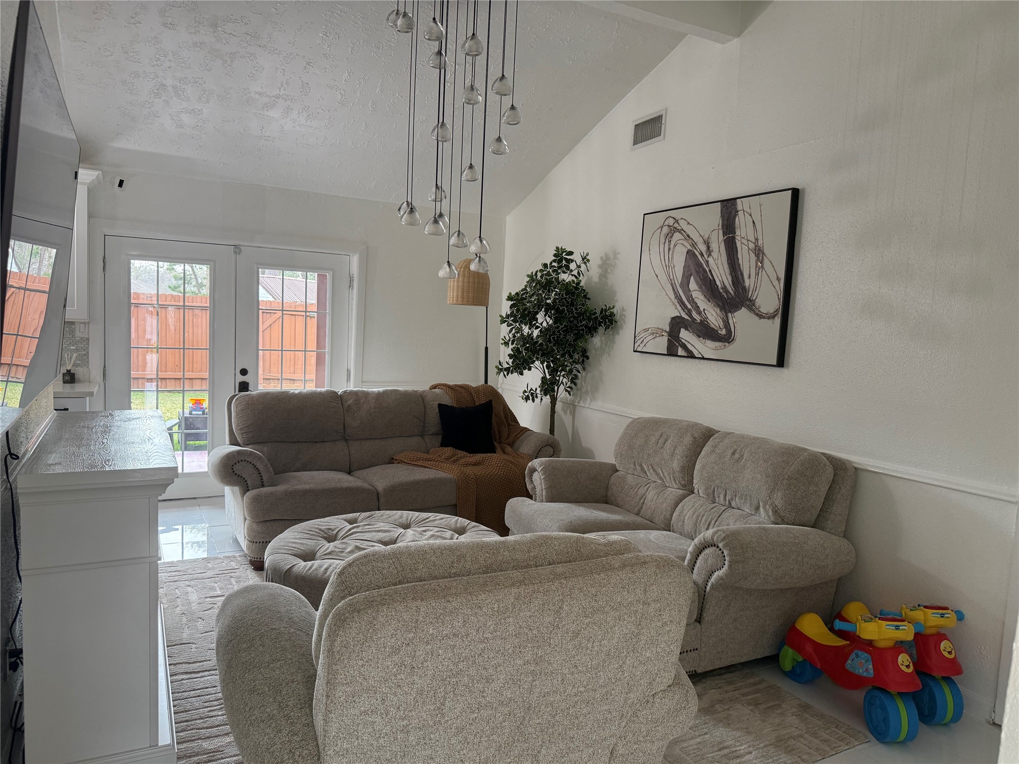 4622 Fitzwater Drive Spring, TX 77373 - Photo 3 of 16 a living room with furniture and a chandelier