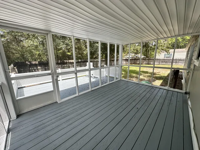 wooden floor with a balcony