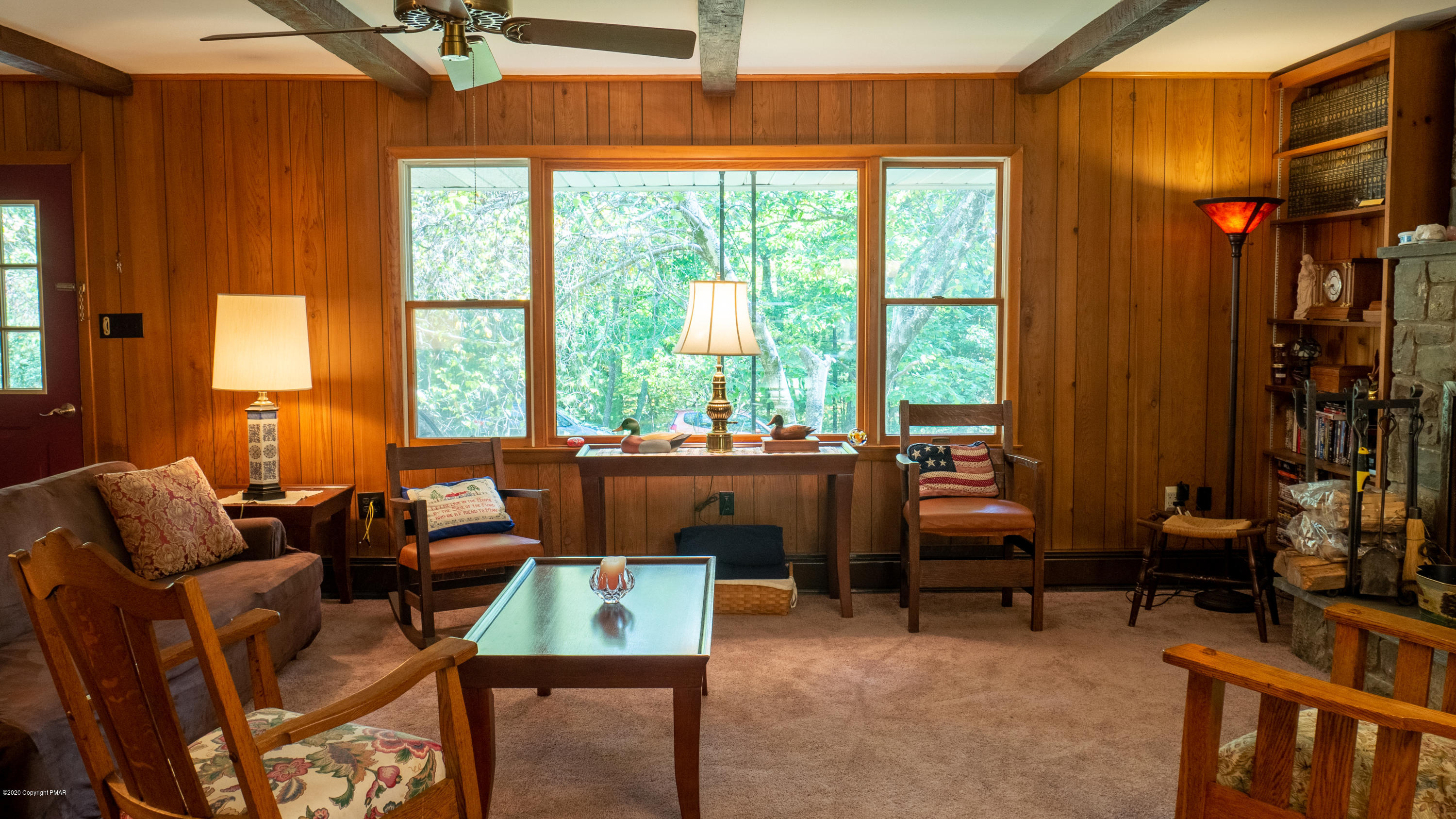 104 Haverhill Road Cresco, PA 18326 - Photo 11 of 90 a living room with furniture and a floor to ceiling window