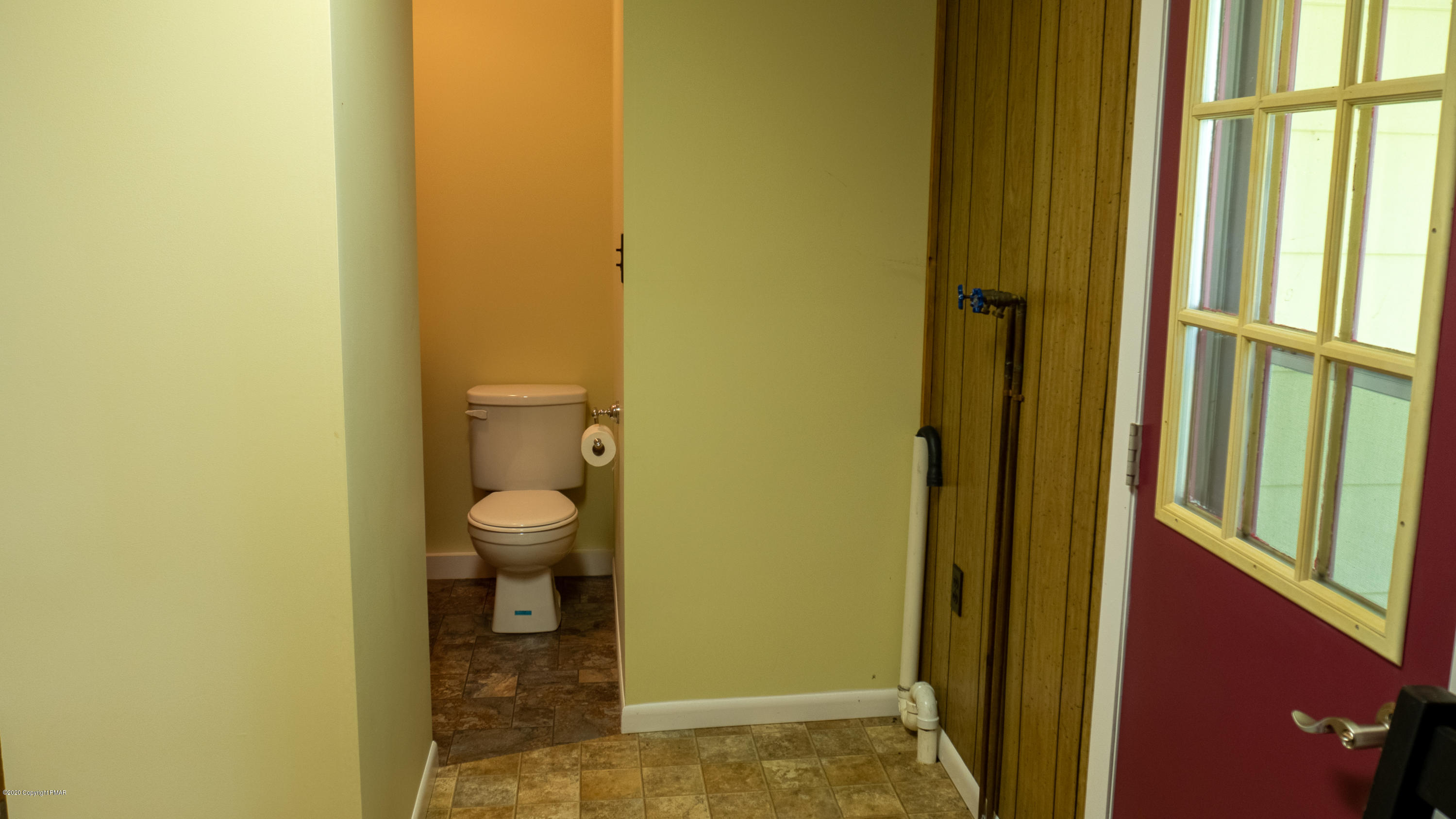 104 Haverhill Road Cresco, PA 18326 - Photo 30 of 90 a bathroom with a granite countertop sink and a toilet
