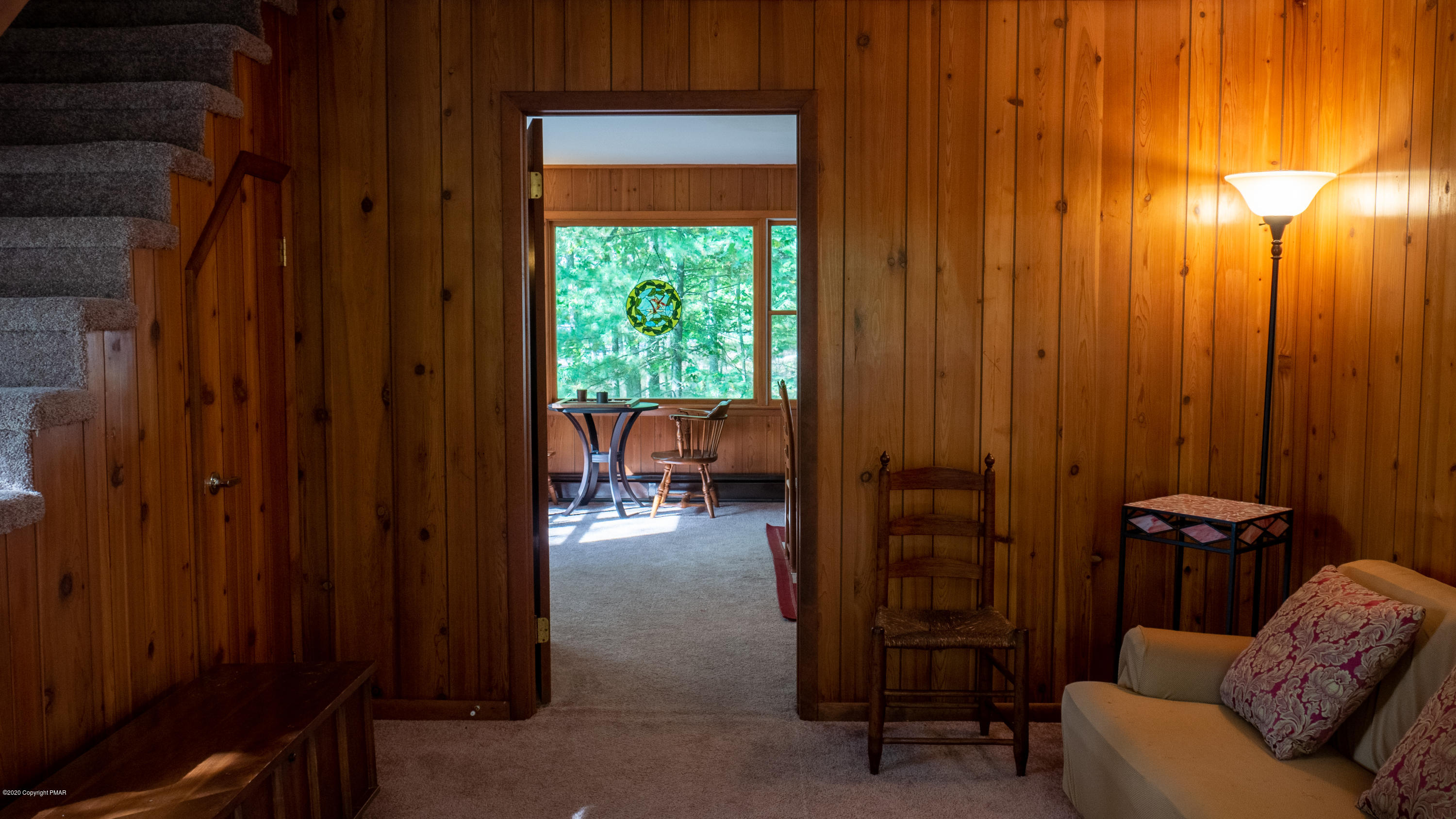 104 Haverhill Road Cresco, PA 18326 - Photo 33 of 90 a living room with furniture and a gate