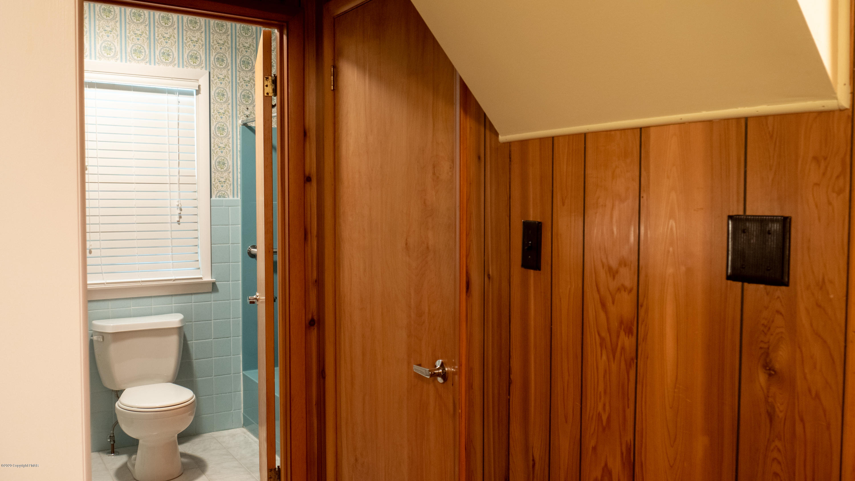 104 Haverhill Road Cresco, PA 18326 - Photo 43 of 90 a bathroom with a shower curtain