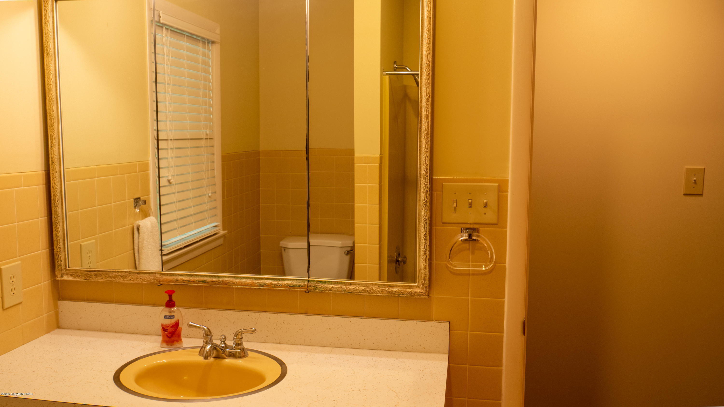 104 Haverhill Road Cresco, PA 18326 - Photo 58 of 90 a bathroom with a sink and a mirror
