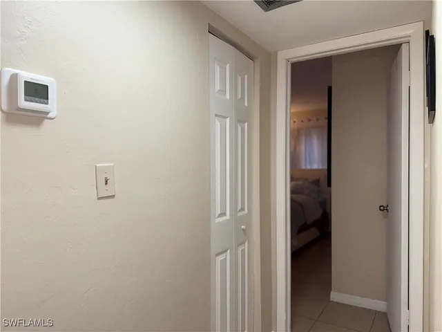 a view of a livingroom and a bathroom