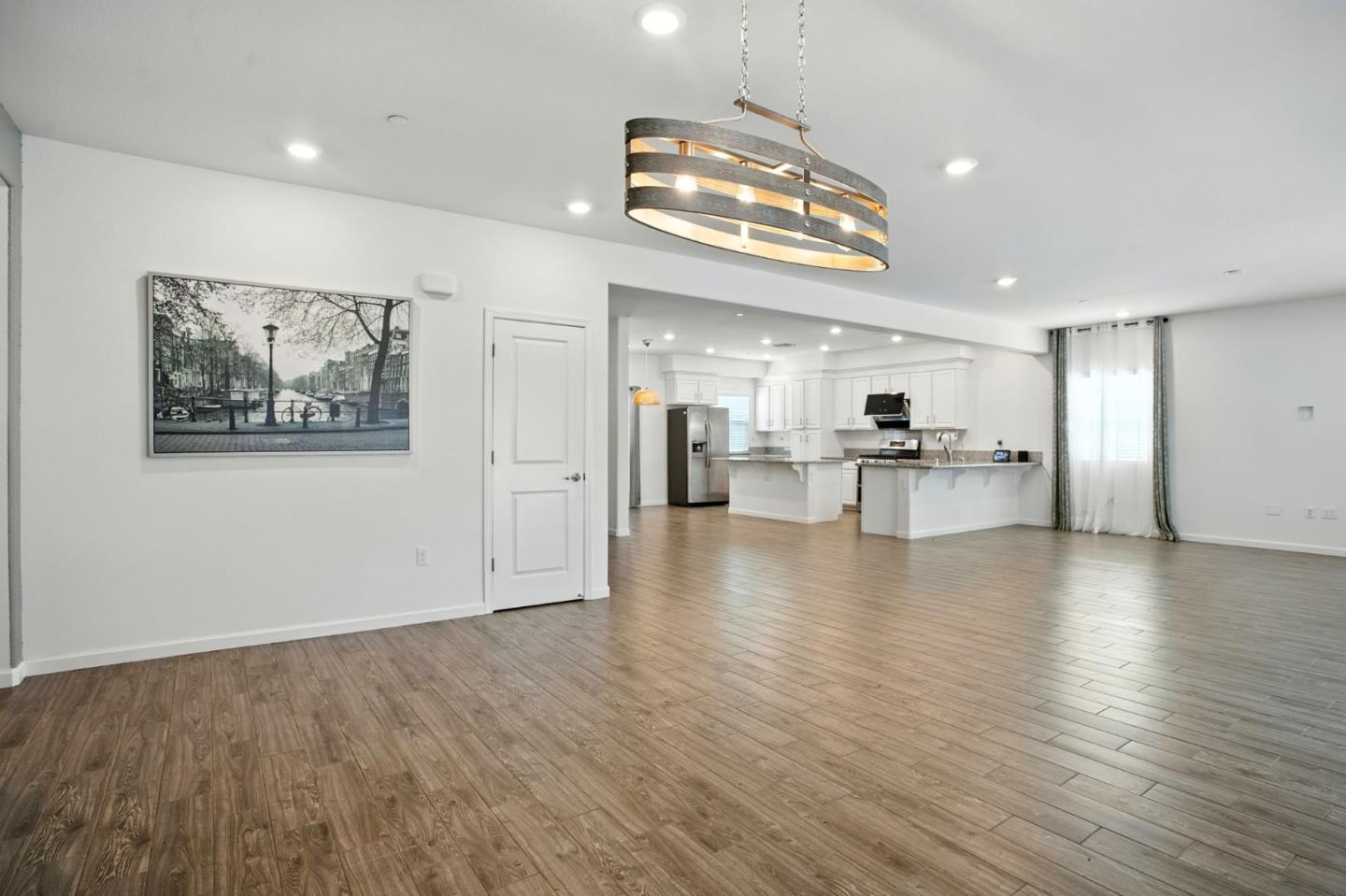 2061 Doncaster Court Olivehurst, CA 95961 - Photo 24 of 46 a view of a kitchen with a sink and a refrigerator