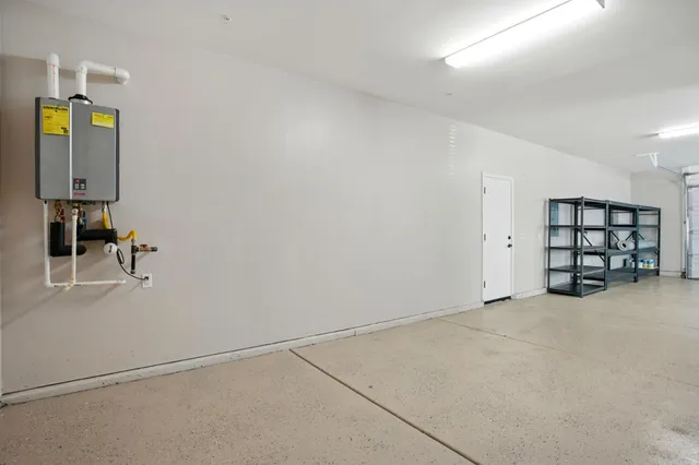 a view of an empty room with garage