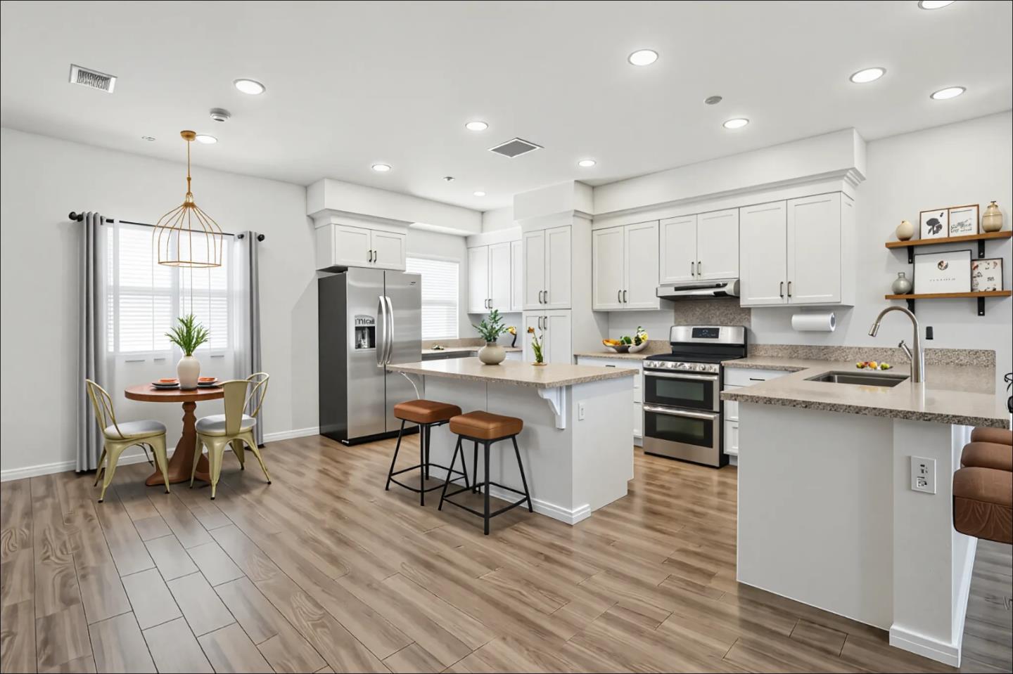 2061 Doncaster Court Olivehurst, CA 95961 - Photo 6 of 46 a kitchen with stainless steel appliances kitchen island granite countertop a stove a sink a refrigerator and a microwave