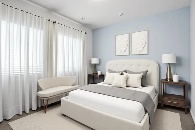 a bedroom with bed and a window