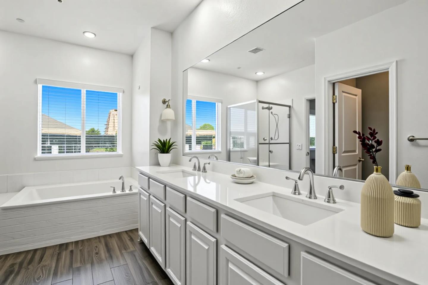 2061 Doncaster Court Olivehurst, CA 95961 - Photo 10 of 46 a bathroom with a sink and a large mirror