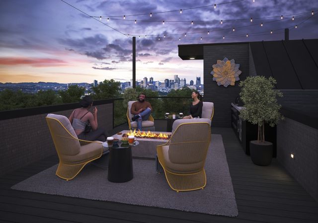 a outdoor living space with furniture and city view