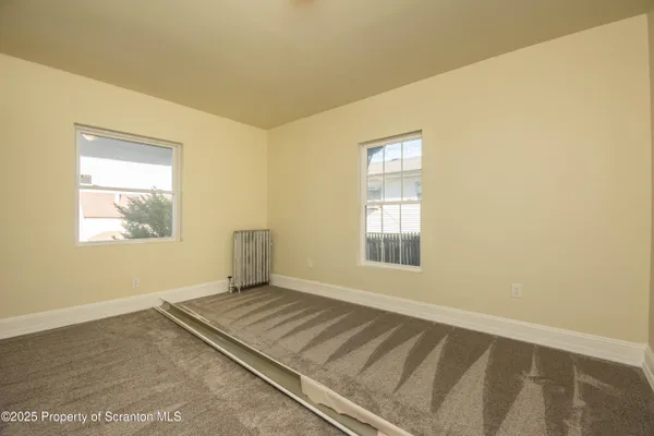 a view of a room with a window