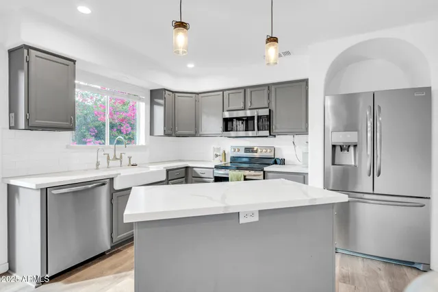 a view of a dining room kitchen and a window