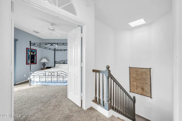 a kitchen with kitchen island a sink stainless steel appliances and cabinets
