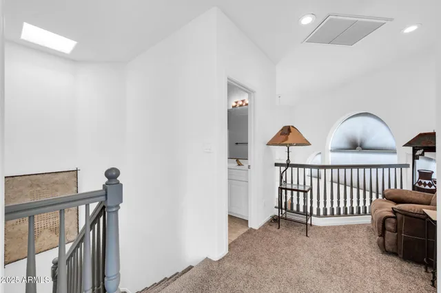 a bedroom with a bed and a cabinets