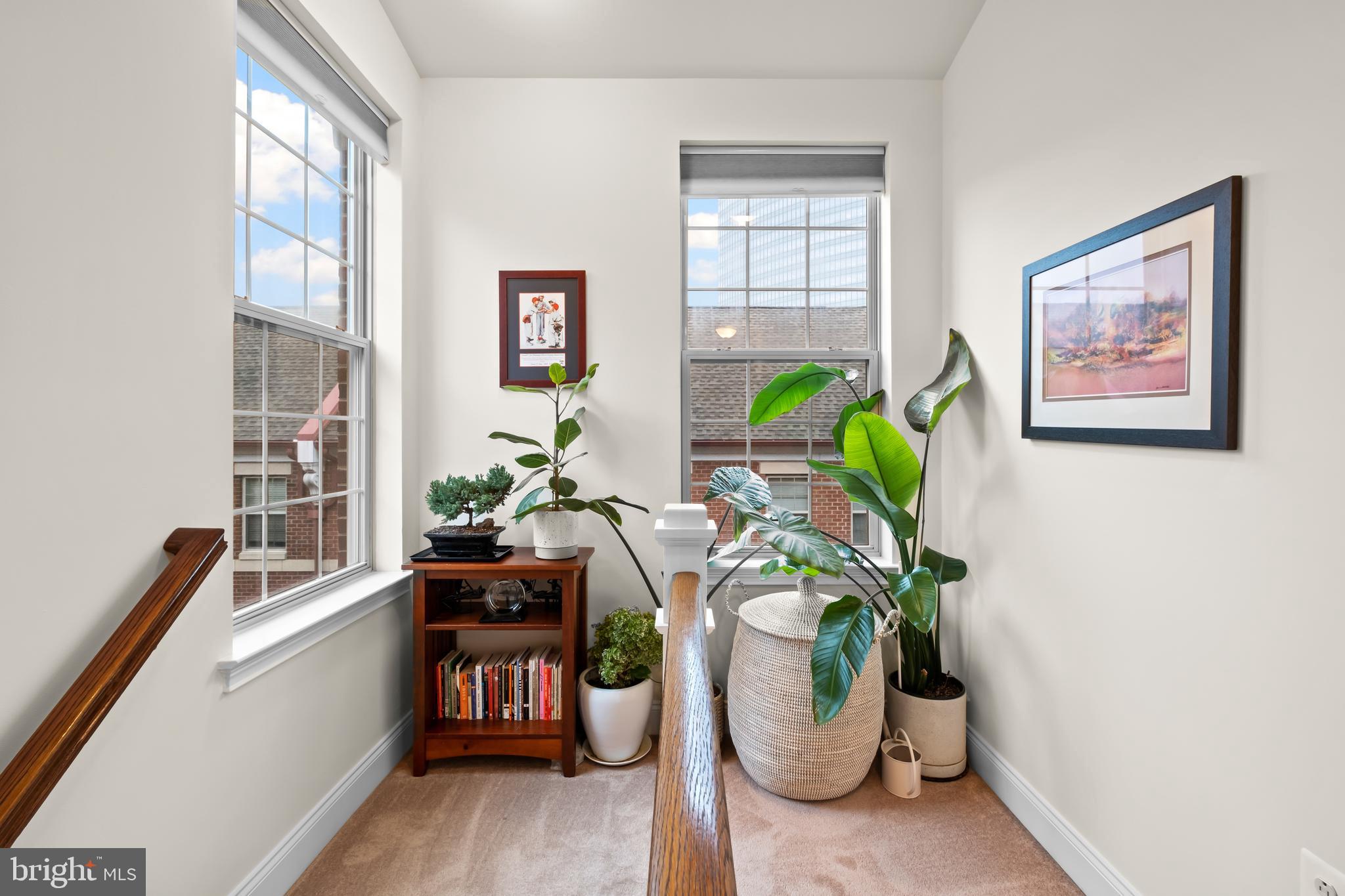 112 Commodore Court Philadelphia, PA 19146 - Photo 20 of 55 a white table with chairs and a potted plant