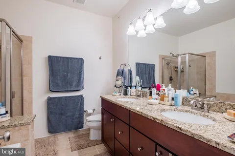 a bathroom with a bathtub and a sink
