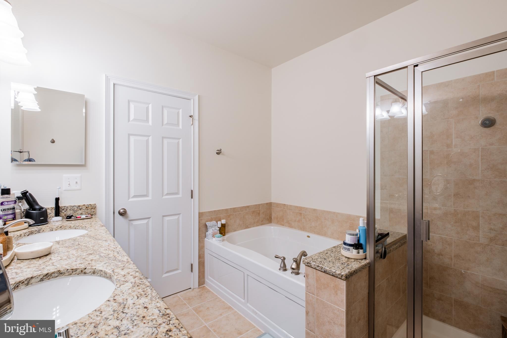 112 Commodore Court Philadelphia, PA 19146 - Photo 27 of 55 a bathroom with a bathtub and a sink