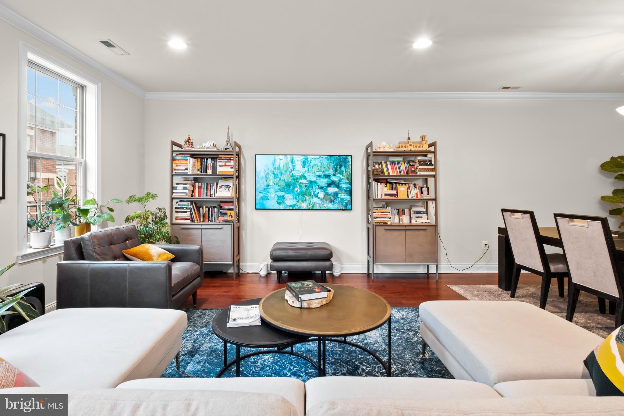 112 Commodore Court Philadelphia, PA 19146 - Photo 3 of 55 a living room with furniture and a book shelf
