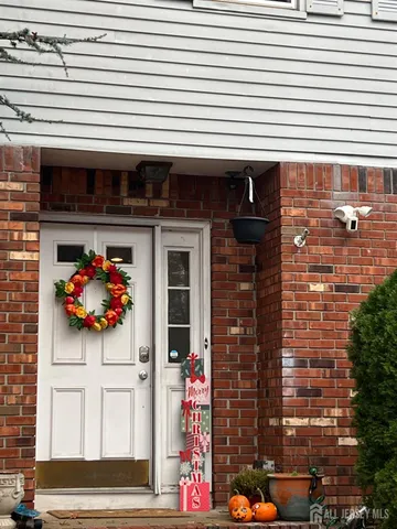 a front view of a building with an outdoor space