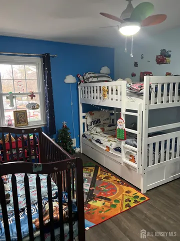 a view of a room with lots of wooden floor