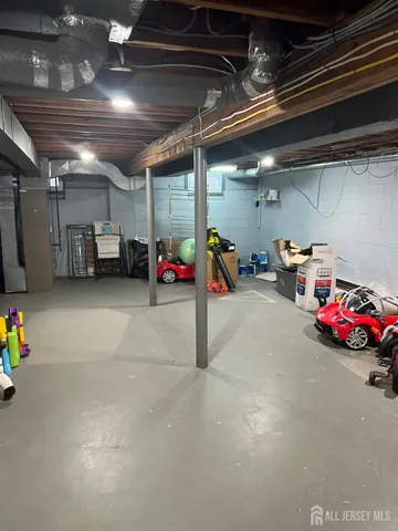 a view of parking garage with cars