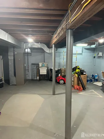 a view of a garage with parked cars