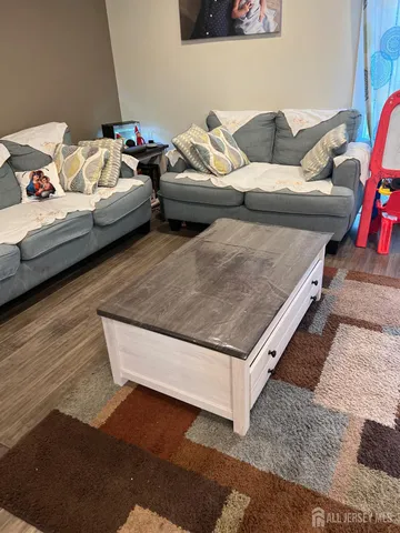 a living room with furniture and a couch