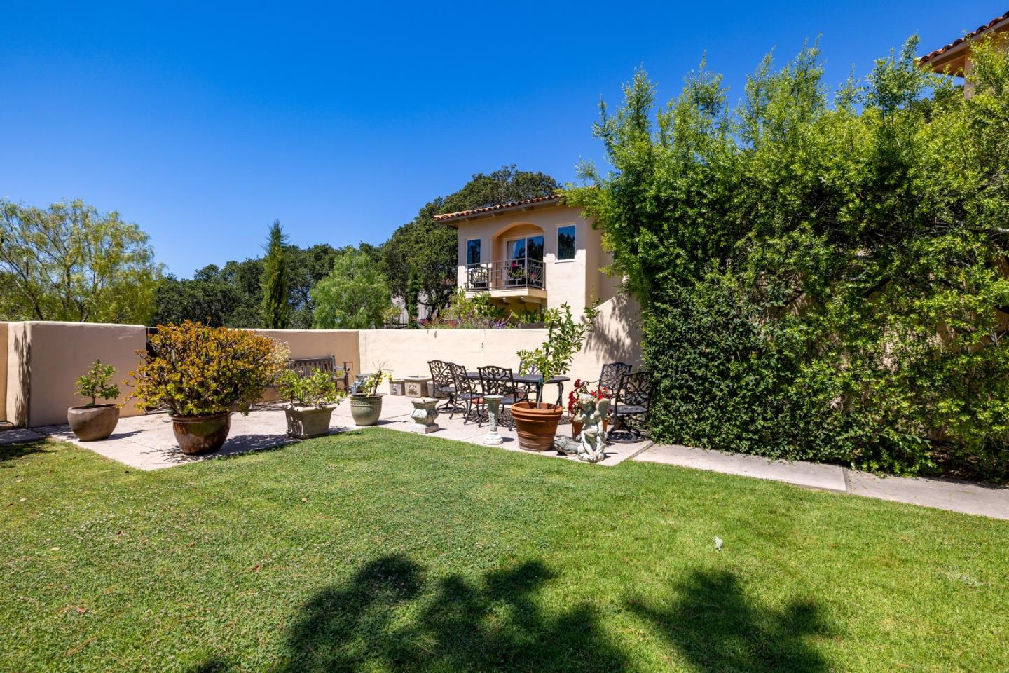 11502 Saddle Road Monterey, CA 93940 - Photo 29 of 40 a house view with a sitting space and garden