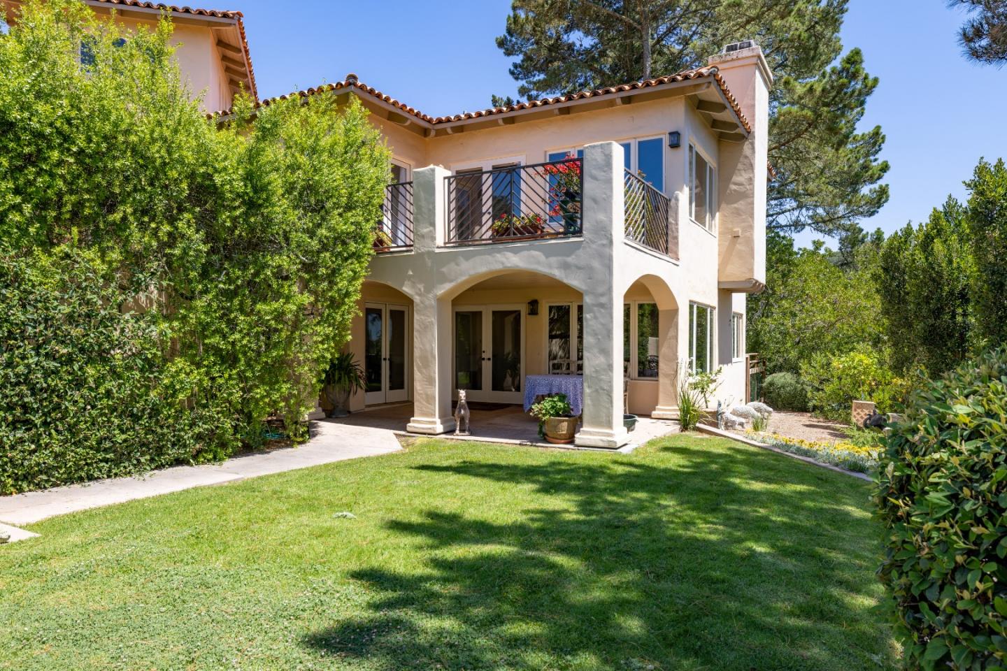 11502 Saddle Road Monterey, CA 93940 - Photo 37 of 40 a front view of a house with a yard and trees