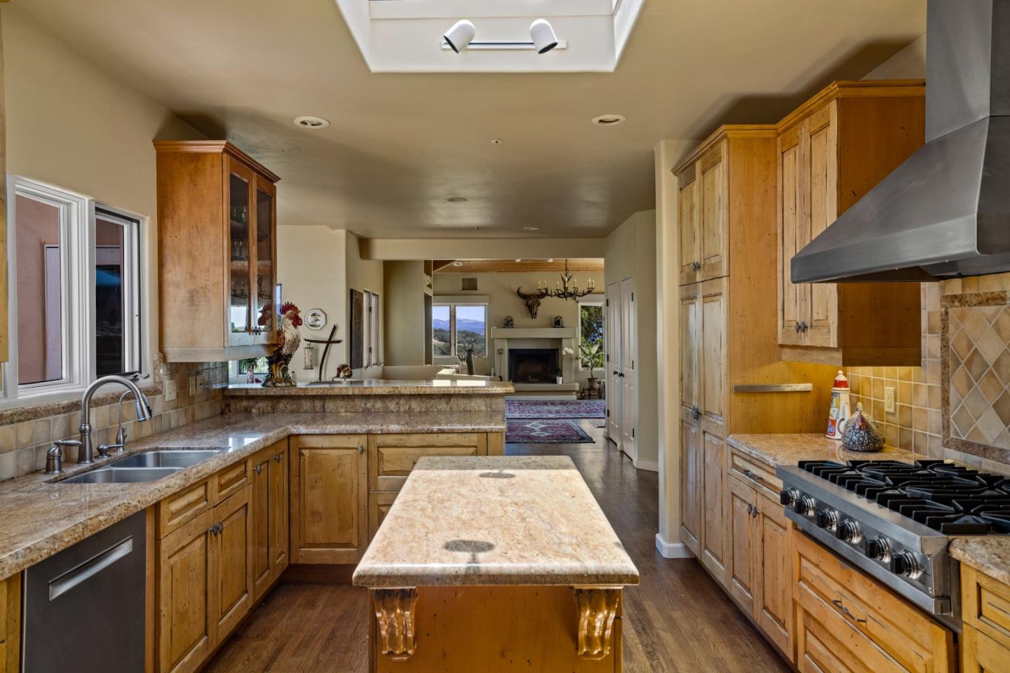 11502 Saddle Road Monterey, CA 93940 - Photo 10 of 40 a kitchen with stainless steel appliances granite countertop a sink stove and refrigerator