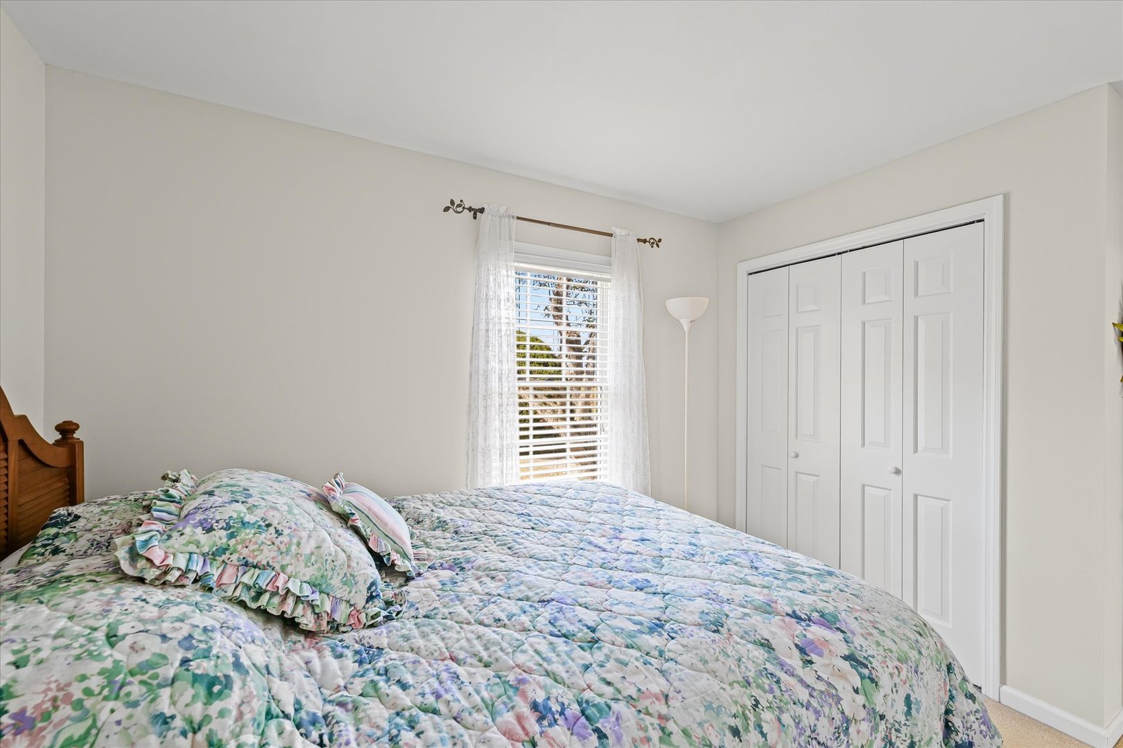 1106 South Spring Lake Road Mahomet, IL 61853 - Photo 11 of 36 a bedroom with a bed and a window
